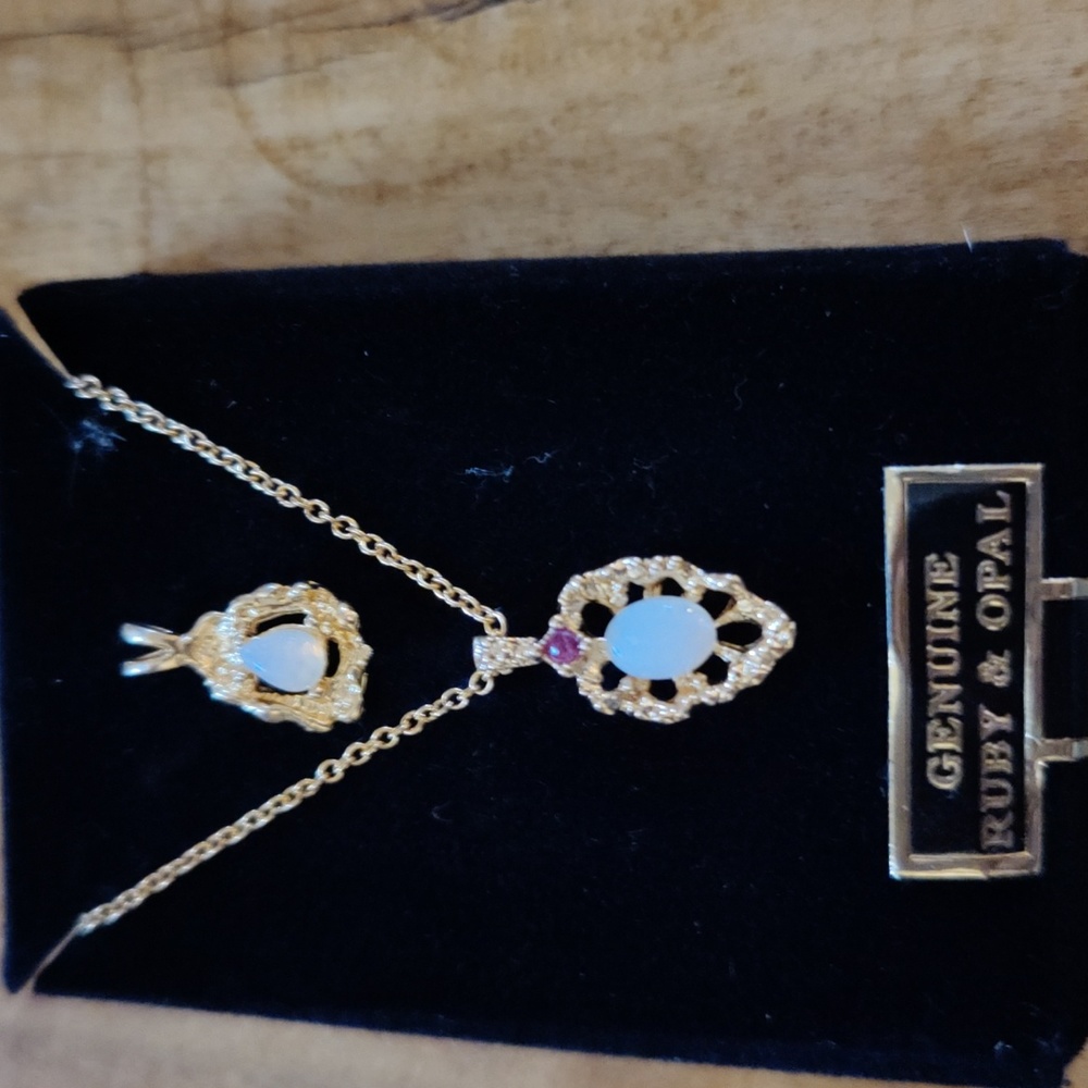 Van Doran ruby and opal pendant 18" chain and extra pendant.